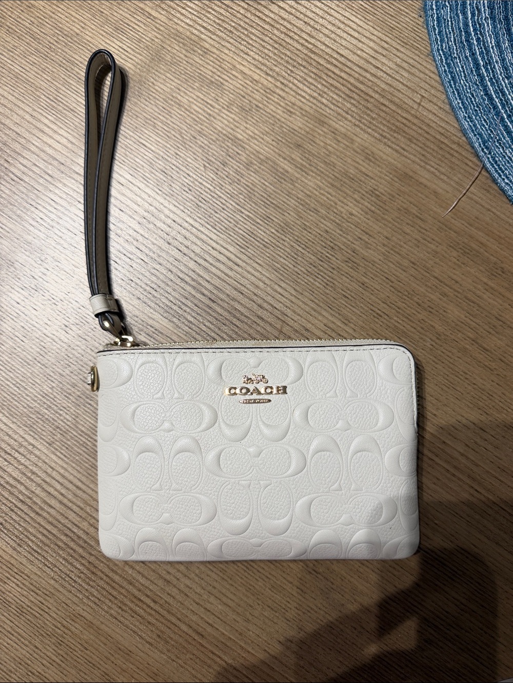 COACH Cream Embossed Signature Wristlet with Gold Hardware